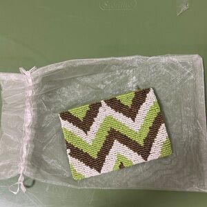 NWOT Beaded Pouch in Zig Zag Design with Top Zipper. 
Green,Metallic Gold, White